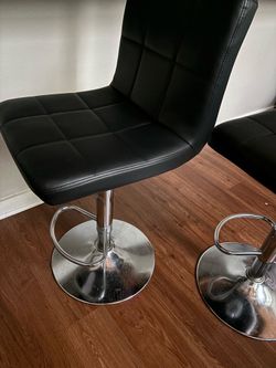 Black leather barstools