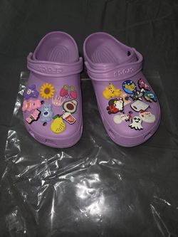 Crocs with charms size 10 womens 8 mens SEGUIN AREA