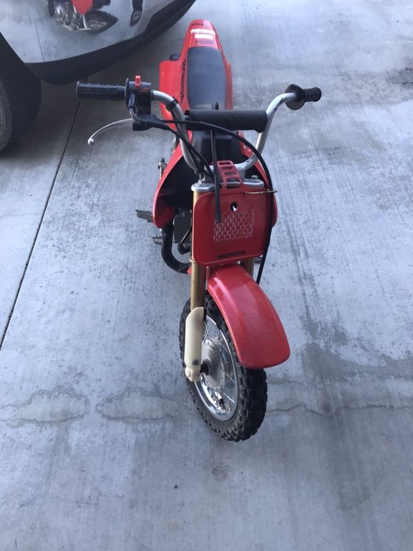 2003 Honda XR 50R . Pink in hand . Training wheels included.