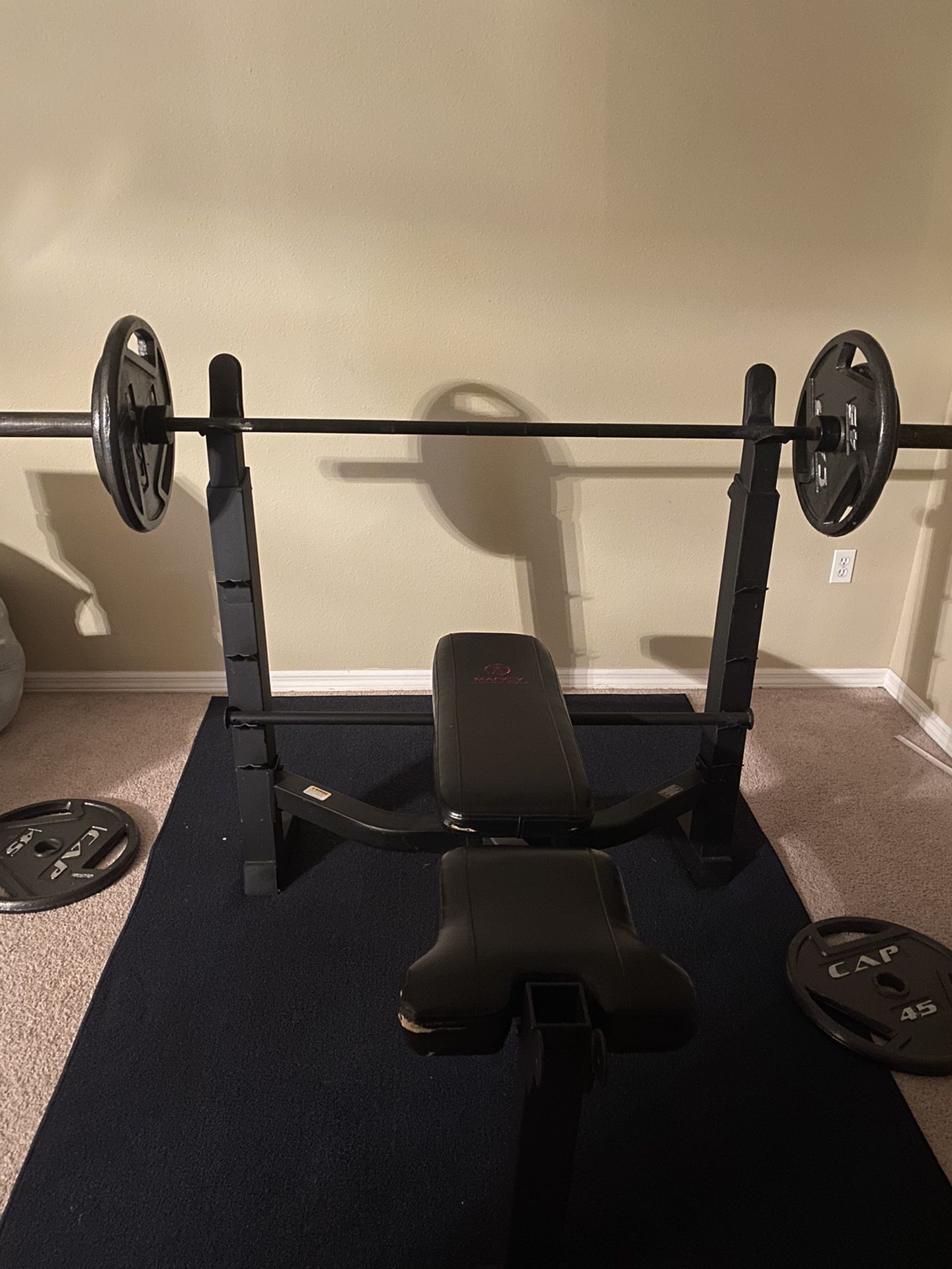 Olympic style weight bench with bar and weights