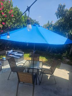 Patio set Table black, 4 chairs, umbrella