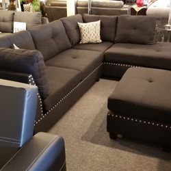Brand New 104" x 75" Black Fabric Reversible Sectional + Ottoman