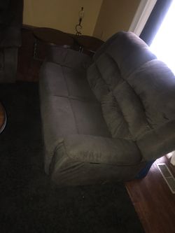 Couch and love seat with coffee/end tables