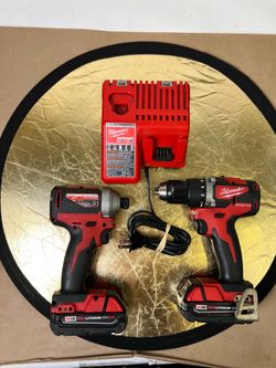 Used Drill and Impact driver Milwaukee 2801-20 2850-20 with 2 batteries, 1 charger
