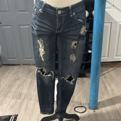 Distressed Blue Jeans