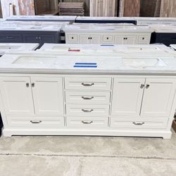 80” bathroom vanity in White, double sink, soft close and solid wood. 6 drawers, 4 Doors and modern handles with marble top in White  $999 