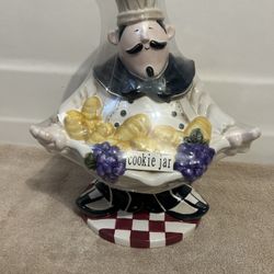Bistro Chef Cookie Jar (New) Where His Collar Is The Opening Of Cookie Jar Measures: 14” (L) Base 7” (W), Middle Of Jar 10”(W) Ceramic