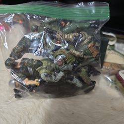 Assorted Army themed posable action figures. 