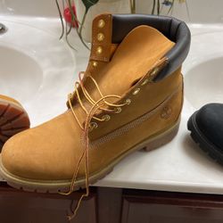 2 Pairs Timberland Boots One Butter Size 11 One Black 10 And Half 