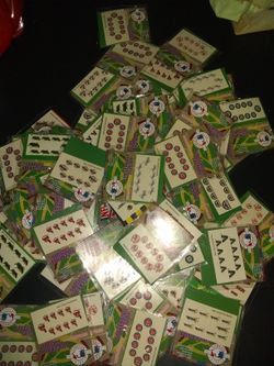 Stack of NFL,MLB,NBA, Fingernail Tattoos.