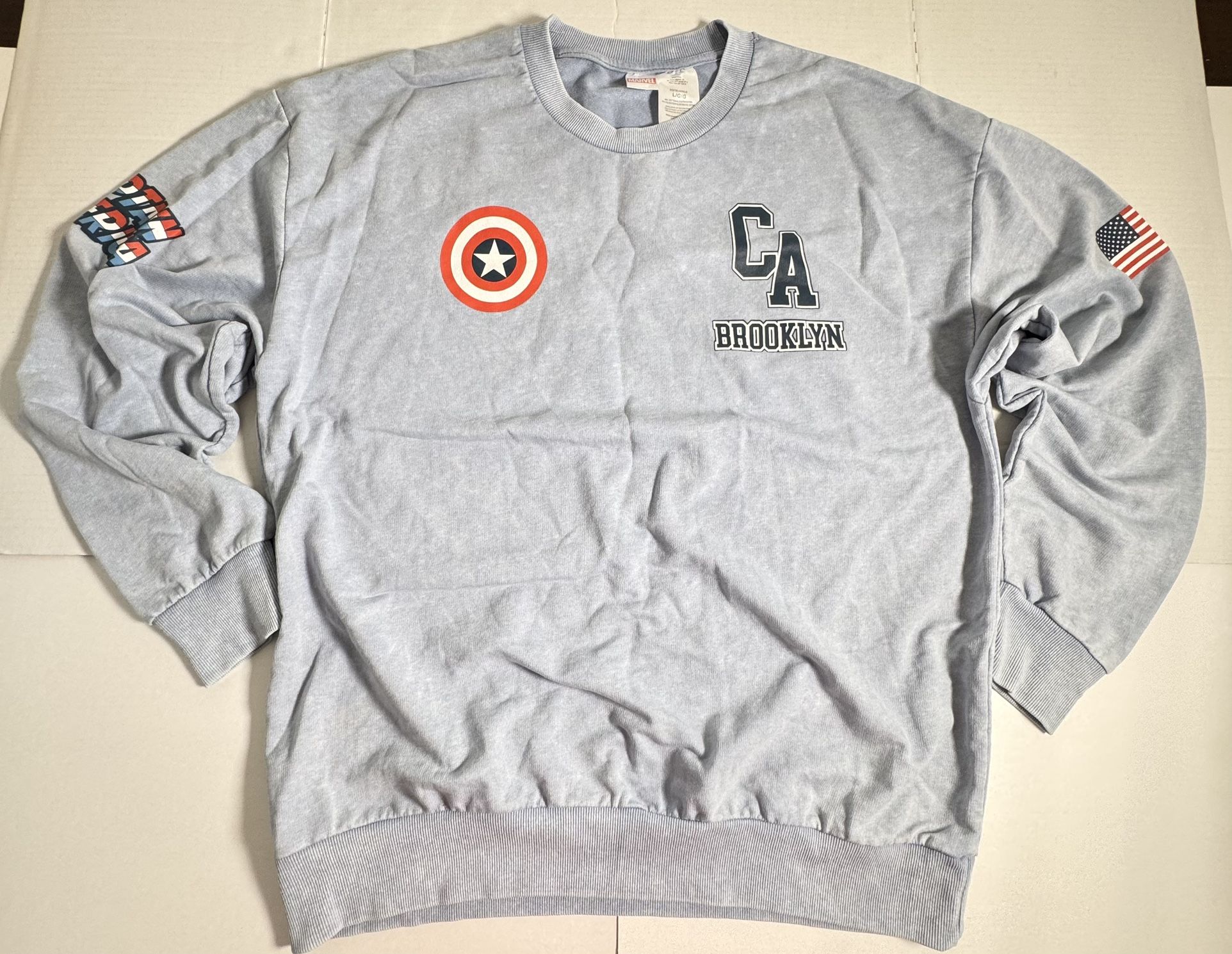 NWOT Captain America Marvel Comics Brooklyn NY 1941 All Over Print Heather Light Blue Sweatshirt Pullover Crewneck Unisex Size Large