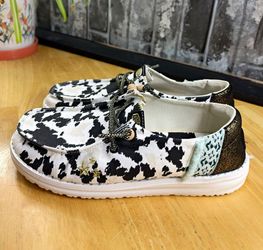 HEYDUDE Wendy Disco Cow Women’s Sneaker Lace Up Black/White US 8 EU 39