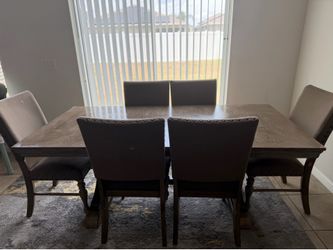 Originally purchased from Rooms To Go. Chairs have some staining from normal family use use