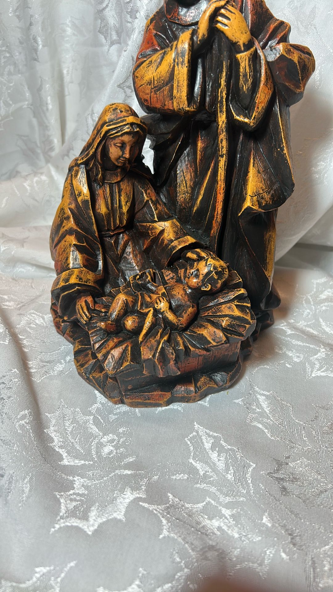 Vintage nativity scene featuring Mary, Joseph and Jesus