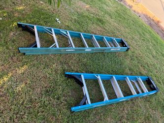2 -Used Werner fiberglass ladders, one 6foot & one 8foot