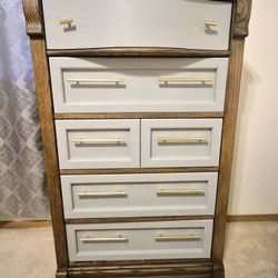 A Dresser, A Chest, And A Jewelry Organizer 