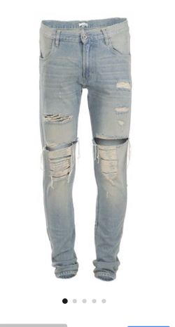 Light indigo Dirty ripped jeans