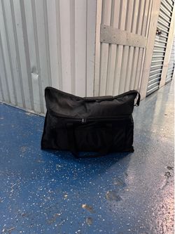 Large monitor carry on or travel bag.