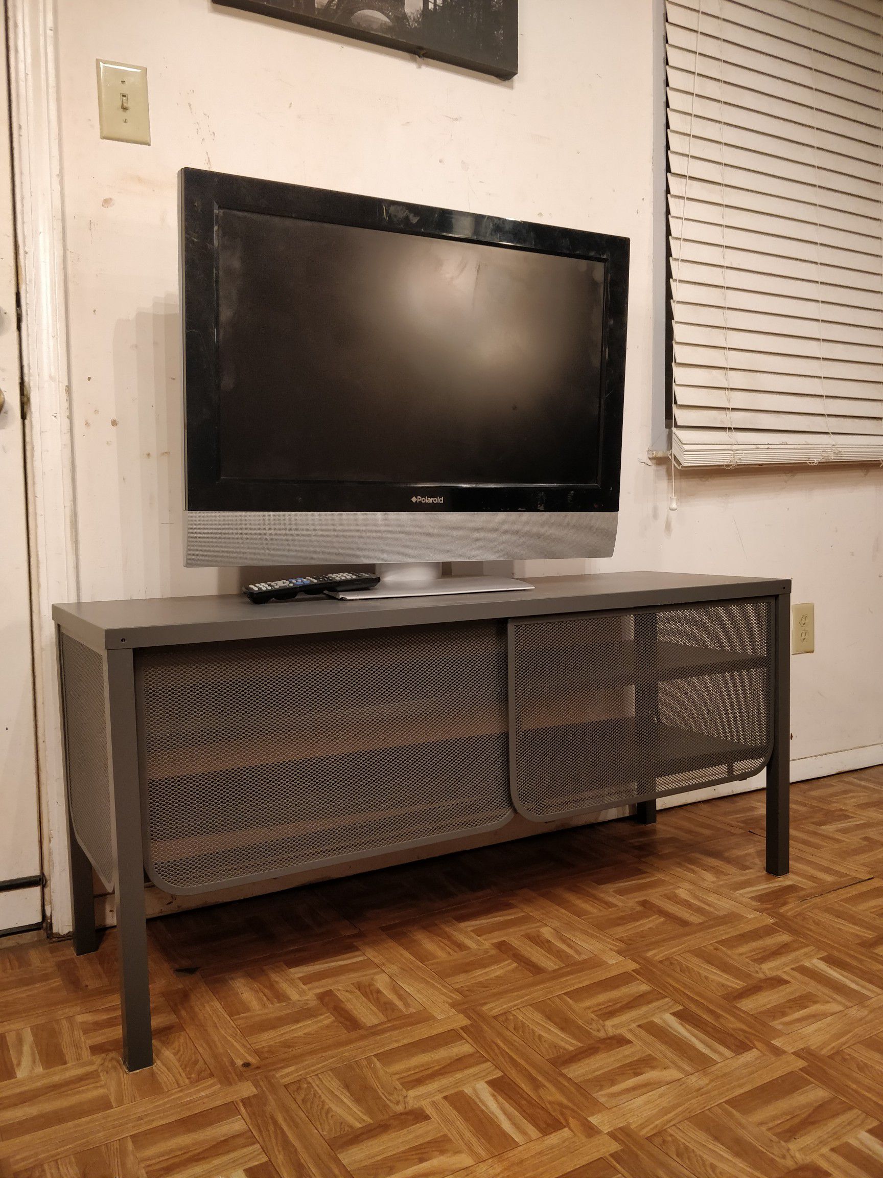 Like new metal TV stand for big TVs with 2 shelves in great condition. L48"*W15.5"*H23"