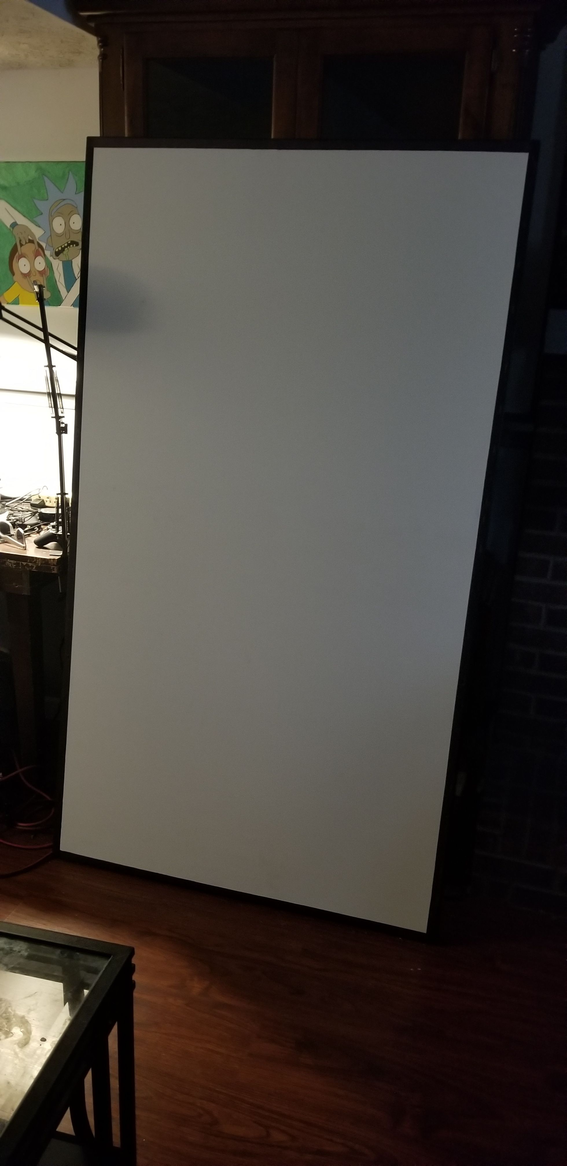 Fixed projector screen appx 6 ft diagonal