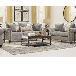 BRAND NEW COUCHES. STILL IN PLASTIC WRAP