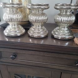 2 Different Sets Of Candle Holders