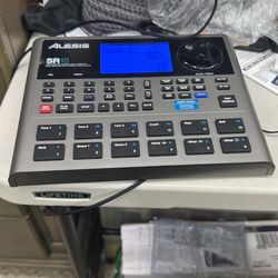 Alesis SR-18 | Studio-Grade Standalone Drum Machine With On-Board Sound Li-brary, Performance Driven I/O and In-Built Effects