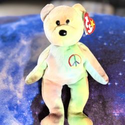 Ty Beanie āPeaceā The Bear 1996 Retired Plush Toy. Brand new with tags. Had been on display with a Ty Beanie Babie Collection.