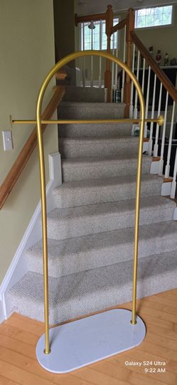 Gold clothing rack