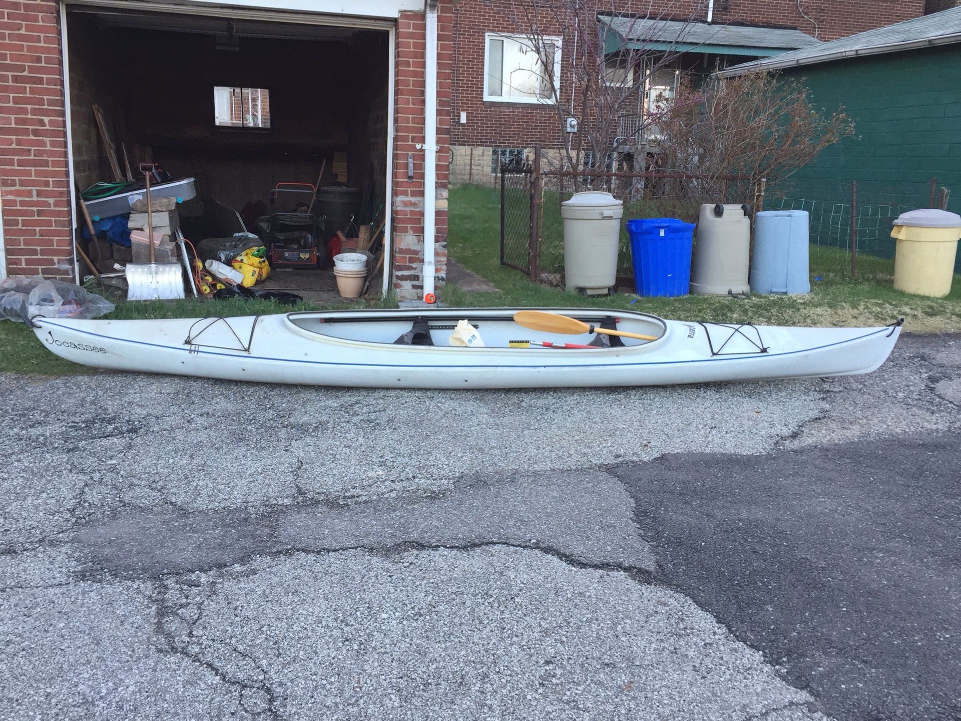 2 and 1/2 person kayak with life vests and 3 paddles