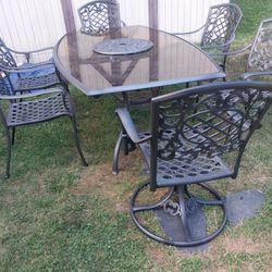 Fortunoff Heavy Duty Cast Aluminum patio set w Lazy susan end chairs are swivel rockers.Can Deliver for Sale in Glenolden PA OfferUp