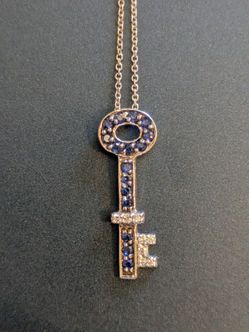 14kt Key pendant with sapphires