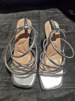 Strappy silver heels