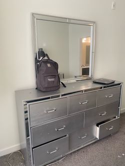 Silver dresser and mirror set