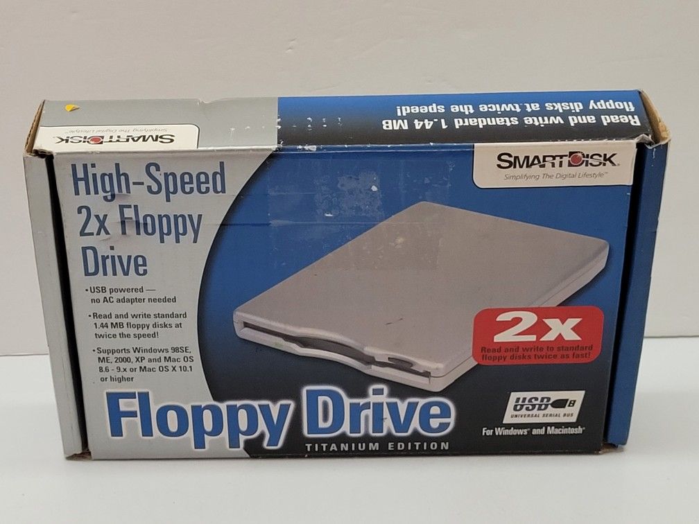 SmartDisk High Speed 2x External Floppy Drive Titanium Edition USB Open Box. This SmartDisk High Speed 2x External Floppy Drive in Titanium Edition is