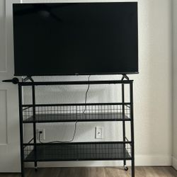 Rolling Metal TV Stand / Kitchen Cart