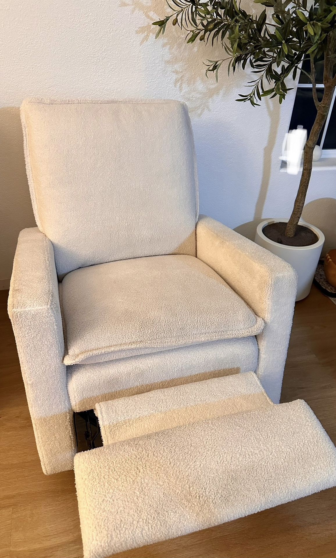 Boucle Glider Recliner  that Swivels And Rocks as well