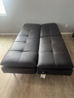 Leather sofa , bed