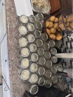 35 mason jars with lids