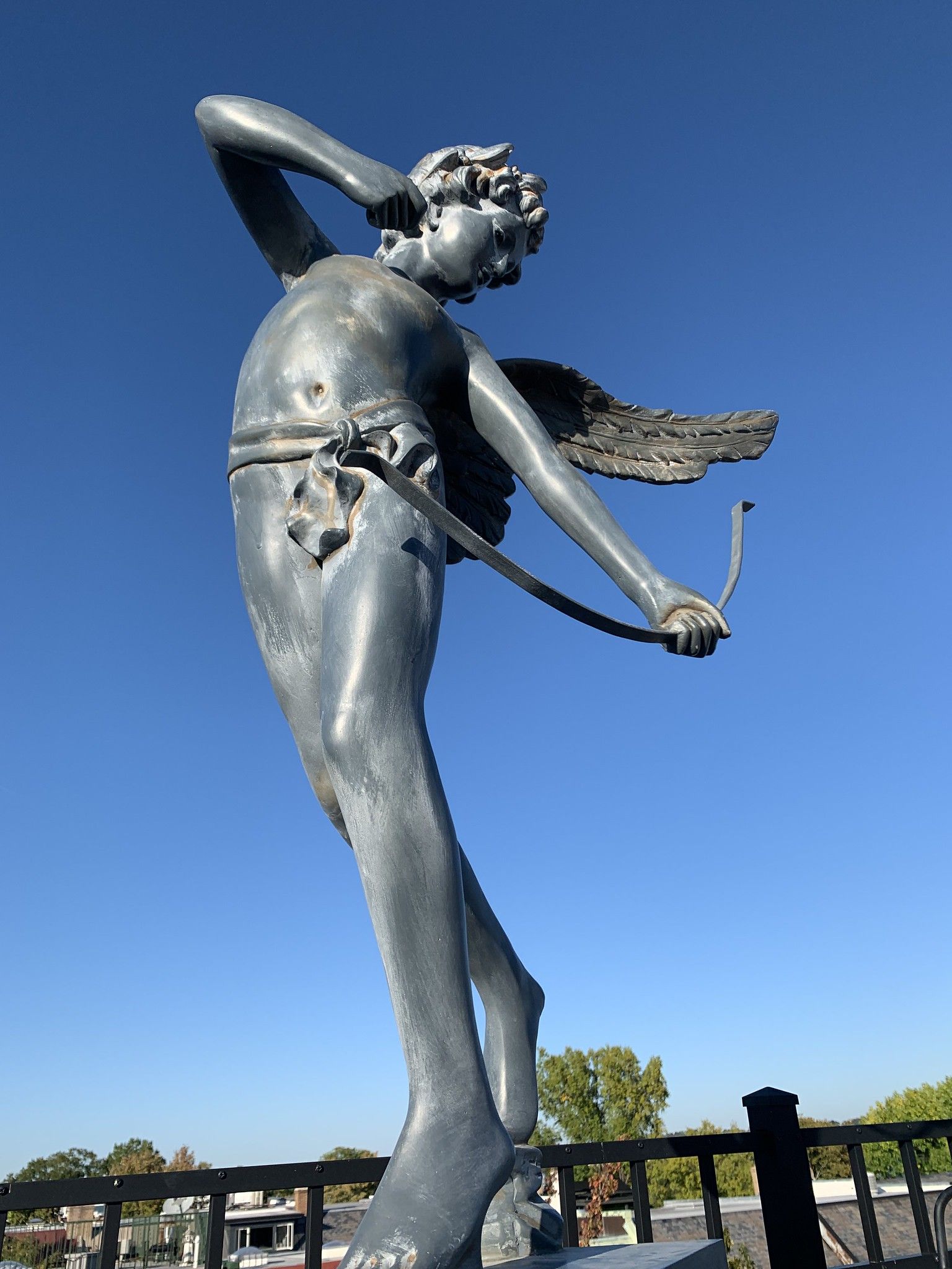 4.5 foot classic representation of winged cupid poised with a bow statue