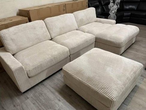 Beige corduroy sectional sofa with ottoman