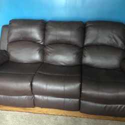 Reclining Sofa And Love Seat Great Condition! One Year Old