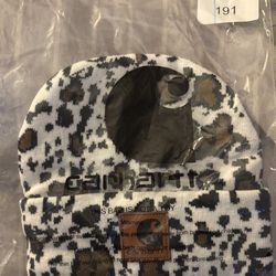 Carhartt Beanie Hat in a black and brown leopard print pattern.        
