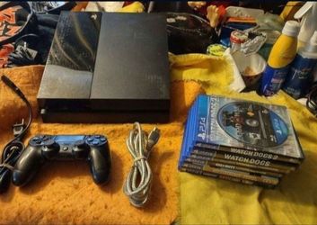 Sony playstation 4 with seven games one controller all hookups tested and works amazing will not separate