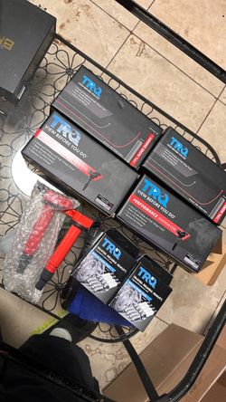TRQ 8 ignition coils and 8 spark plugs brand new in box