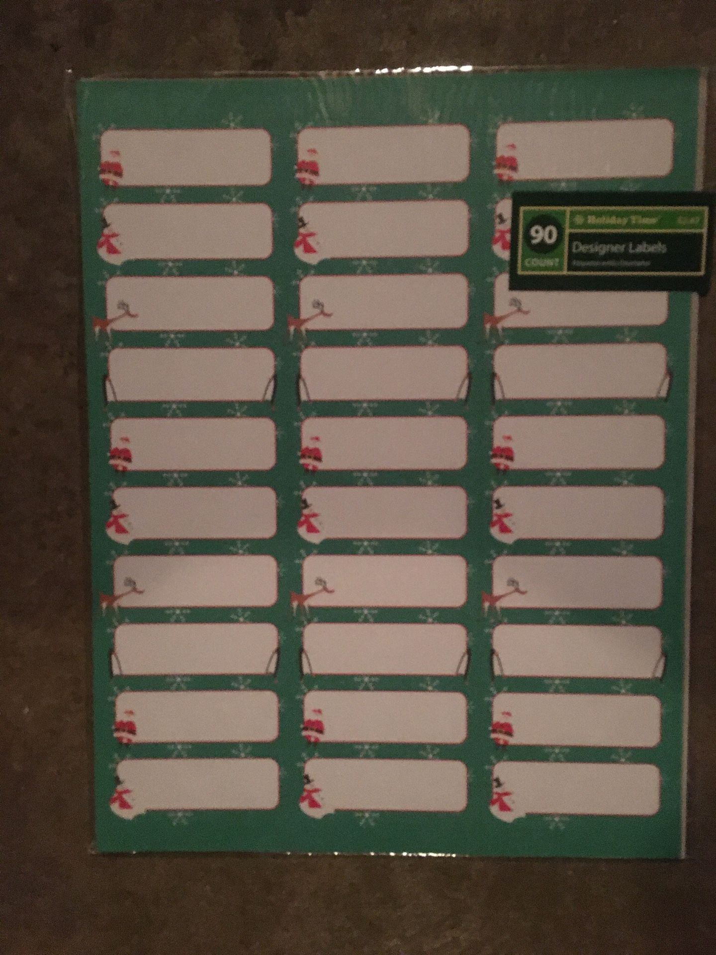Designer Christmas labels, paper, and envelopes for $0.50 per pack or $50 for all