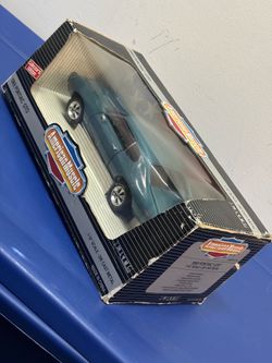 ERTL American Muscle 1:18 Scale Crystal Turquoise 1969 Pontiac GTO Diecast Car