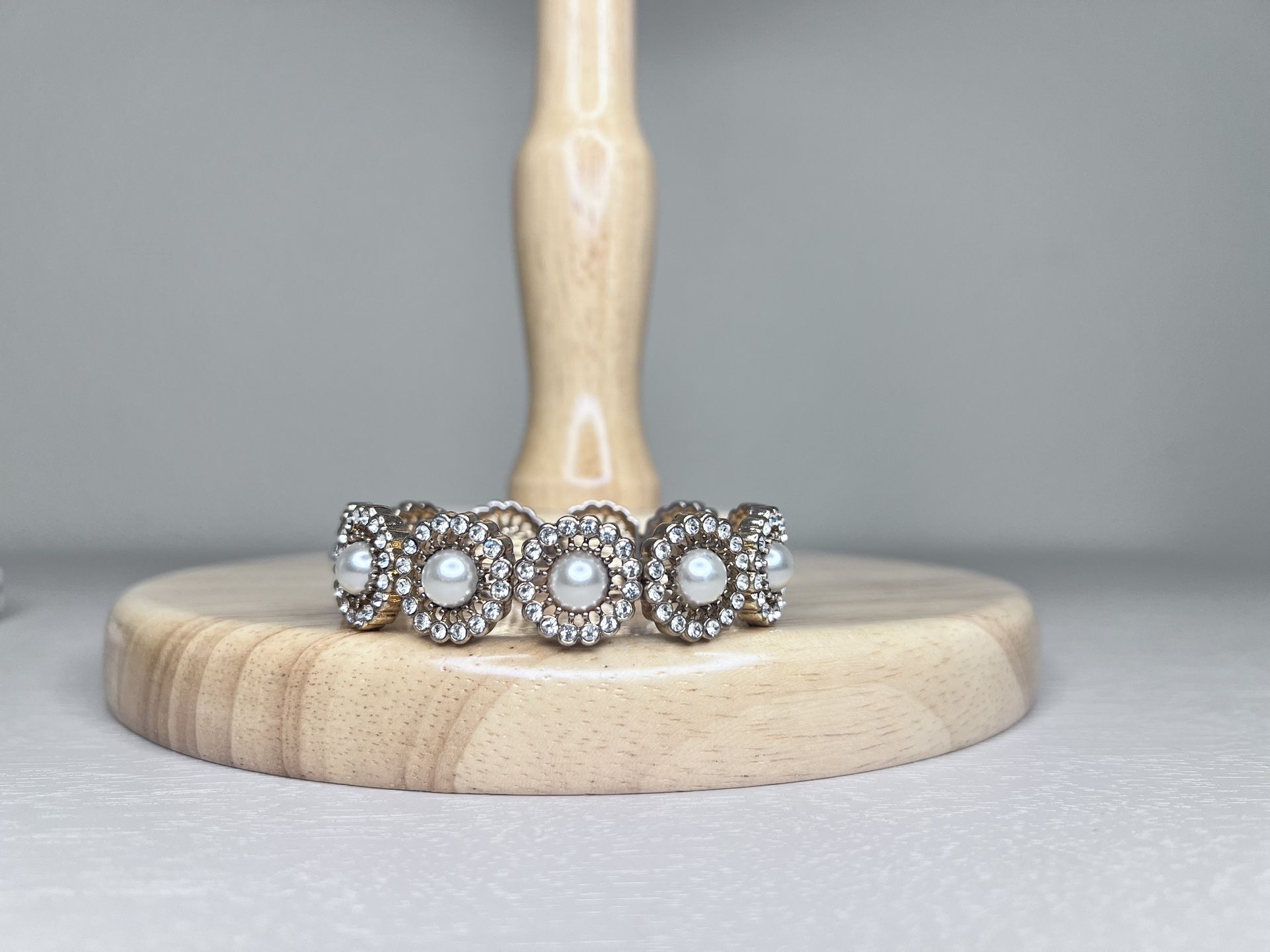 Coppery gold faux pearl and rhinestone stretch bracelet