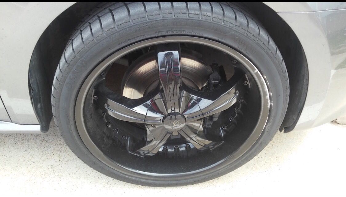Black 20 inch rims and tires