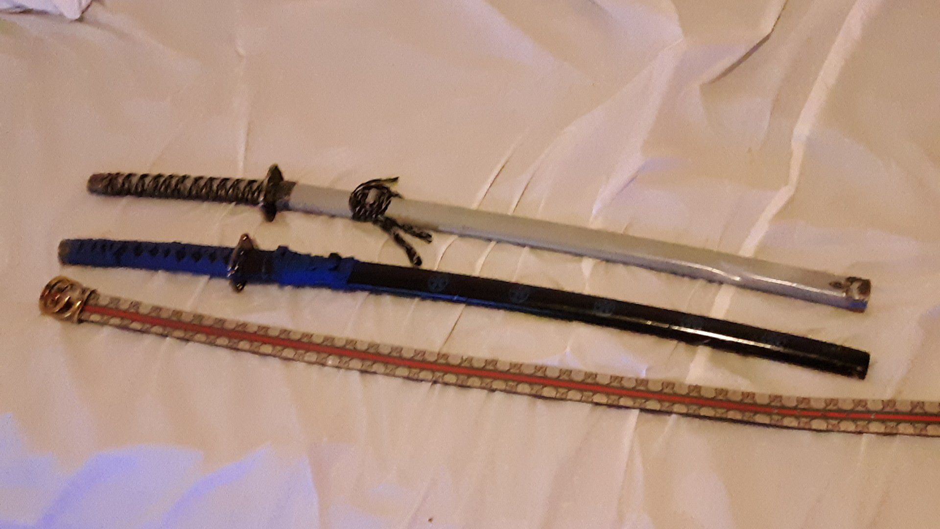Swords and gucci belt
